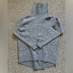 Woman’s Turtleneck Sweater